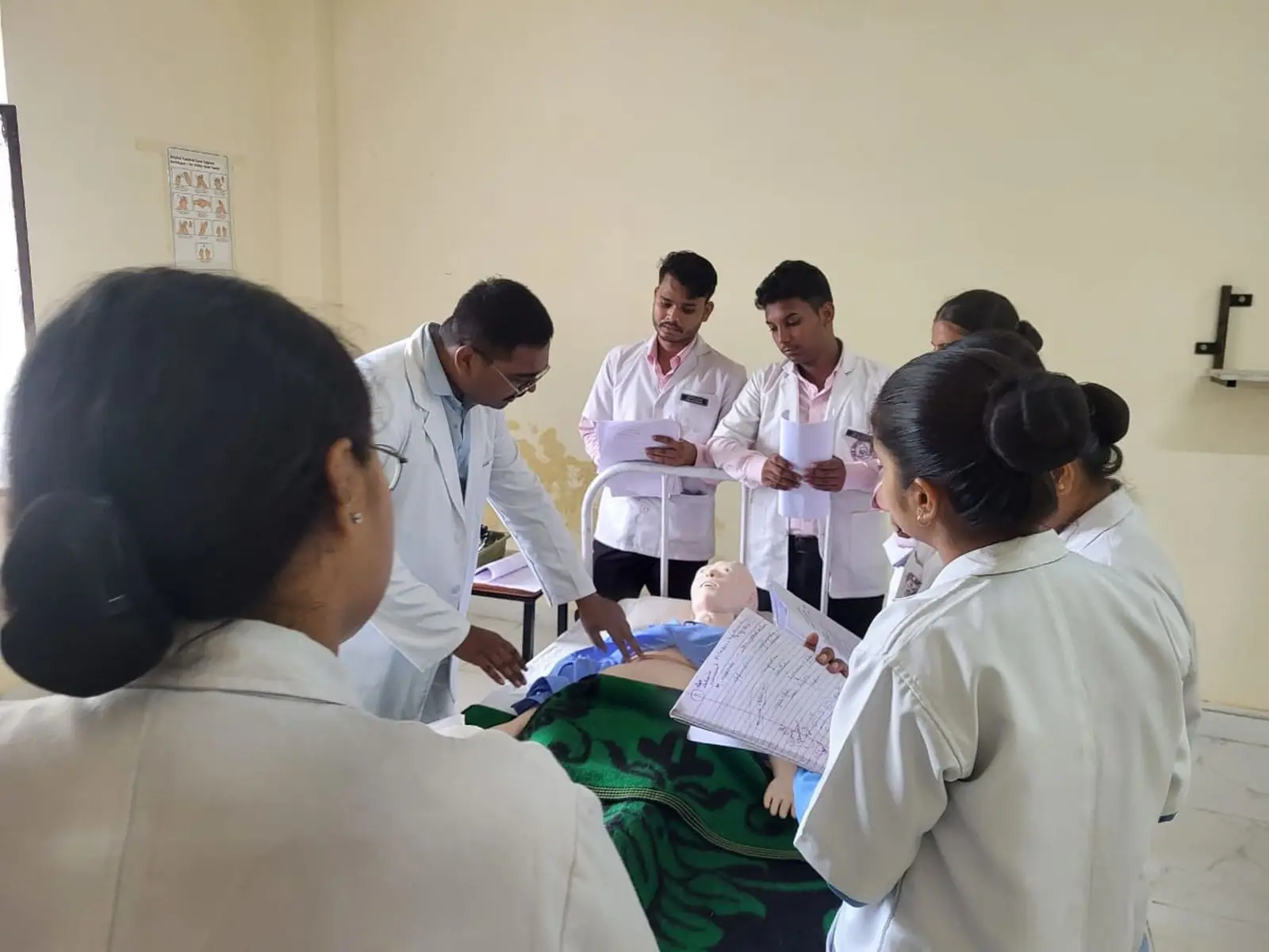Clinicians in a hands-on medical training session