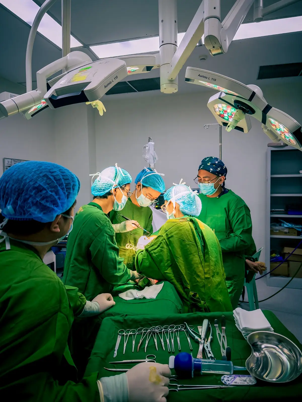 Surgical team working together in an operating room